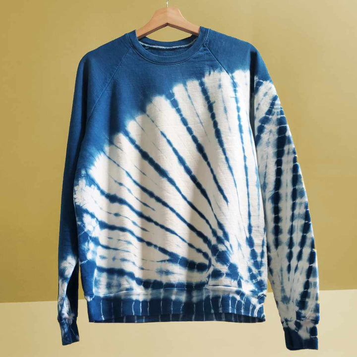 Indigo Plant Dyes were used to create a starburst pattern on this organic cotton sweatshirt, made in the USA and designed by Rare Breed.