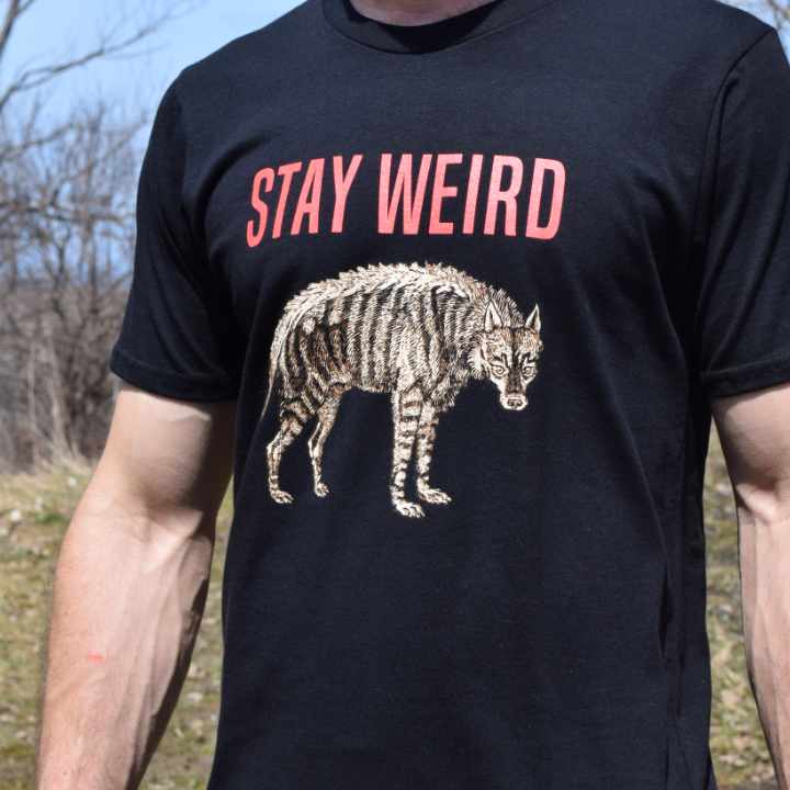 Organic cotton men's graphic T-Shirt by Rare Breed Organic Apparel featuring a retro hyena and "Stay Weird" manifesto.  
