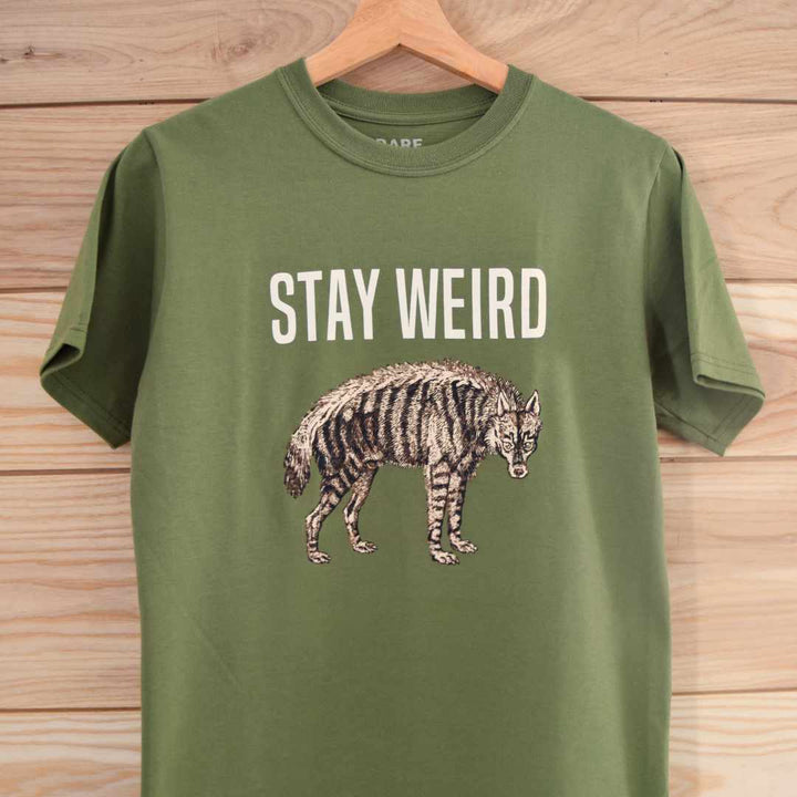 Organic Cotton T-Shirt from Rare Breed Organic Apparel with "Stay Weird" slogan and hyena recoloured from a historical illustration. Ethical clothing available for shipping to customers in Canada and the United States.